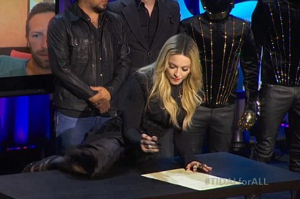 Madonna signed as a co-owner at the event / Credit: Tidal
