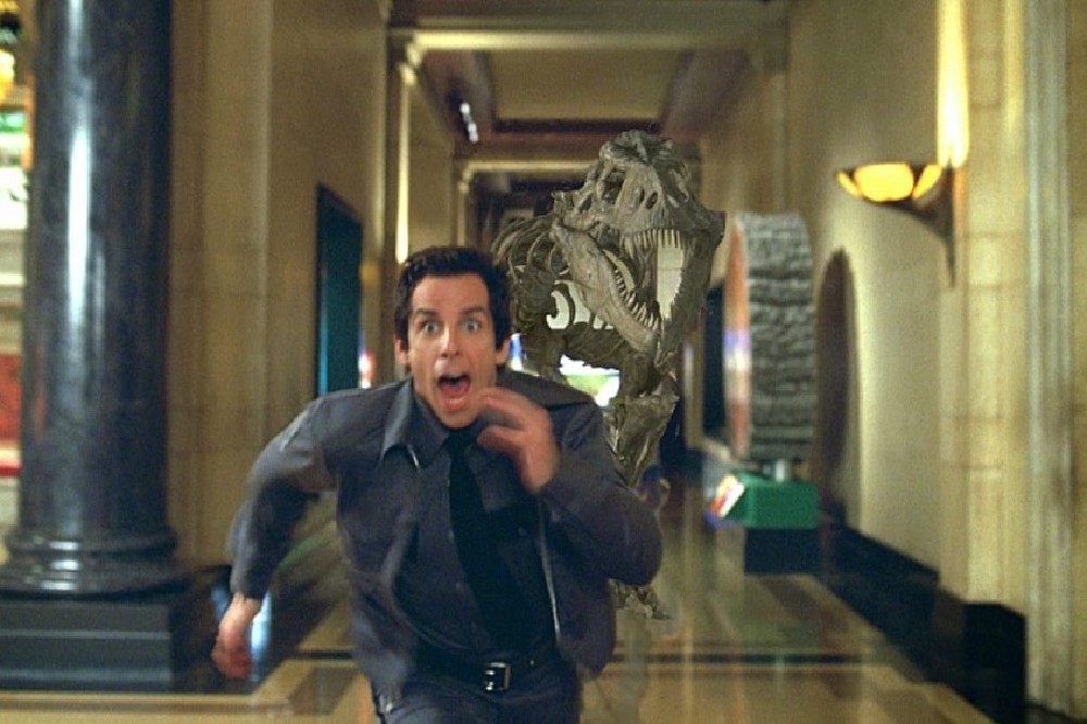 Larry running from the T-Rex exhibit / 20th Century Studios