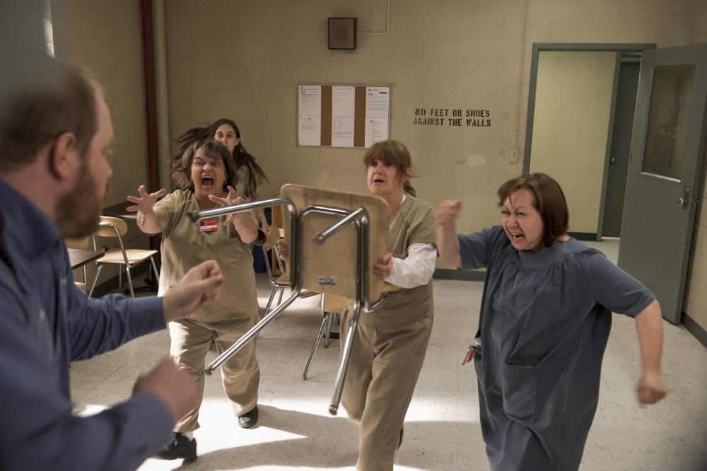 As tensions escalate a prison riot breaks out / Credit: Netflix