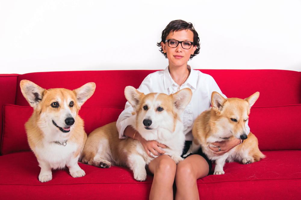 Millie Bobby Brown enjoys The Crown with the show's corgis!