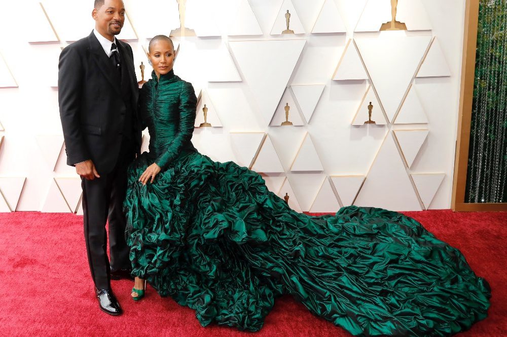 Jada Pinkett-Smith in Jean Paul Gaultier, and Will Smith at the 2022 Oscars / Kay Blake/Zuma Press/PA Images