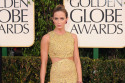 Emily Blunt added an embellished box clutch to her Michael Kors gown