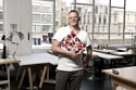 Giles Deacon poses with his Minnie Sky box
