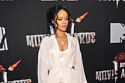 Rihanna looks sexy in her linger-inspired outfit