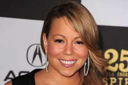 Mariah Carey Still At Husband's Bedside