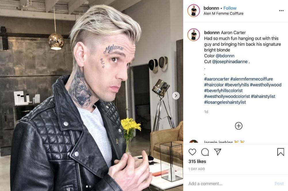 Aaron Carter gets girlfriend's name tattooed on his face