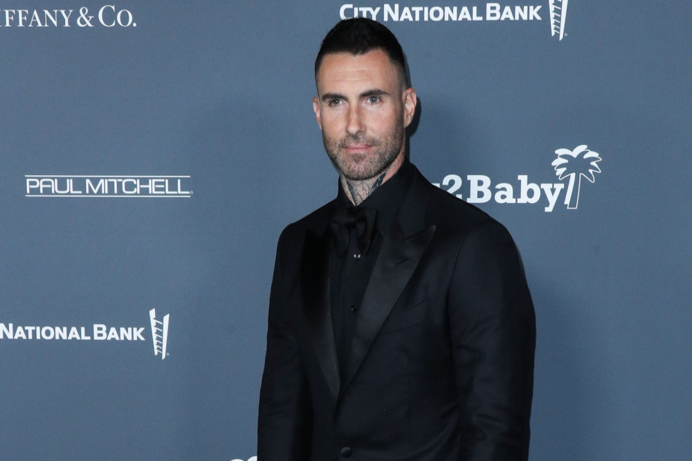Adam Levine has been accused of flirting by a fourth woman