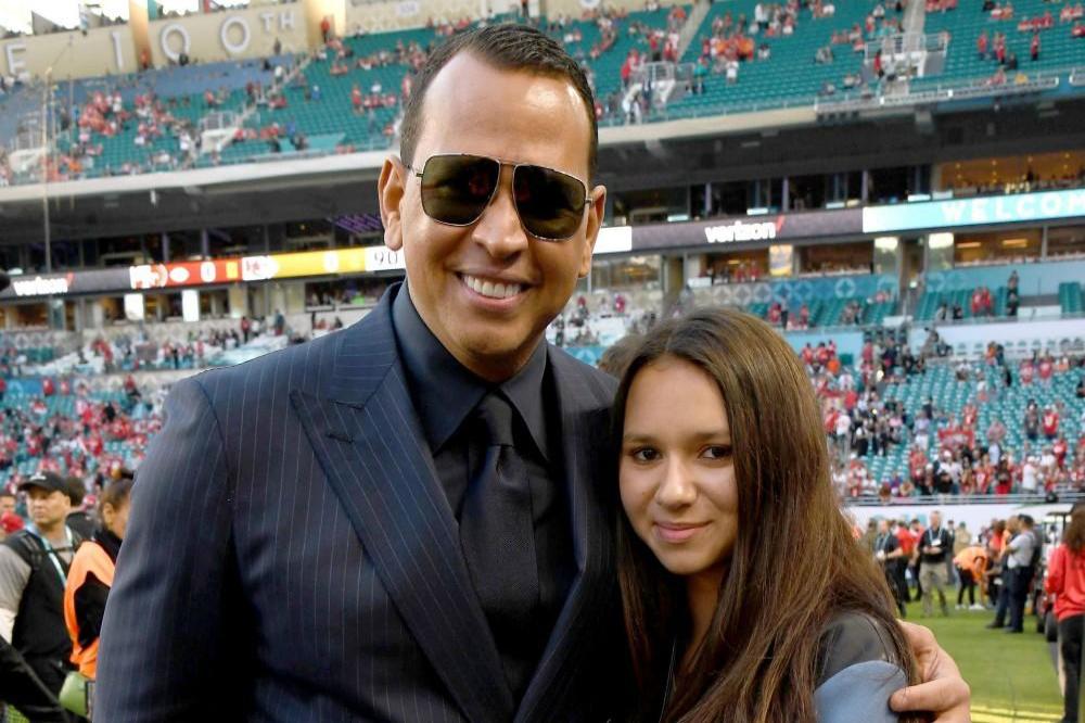 Alex Rodriguez and his daughter Natasha at the Super Bowl