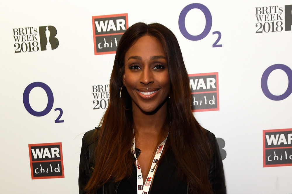 Alexandra Burke is expecting her first child