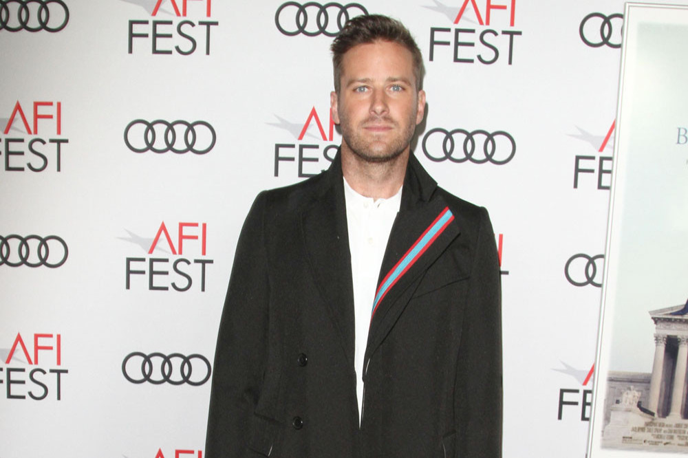 Armie Hammer is said to be living in a house owned by Robert Downey Jr.
