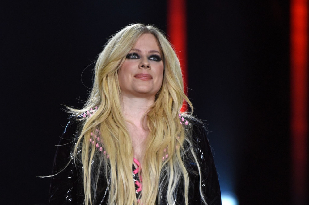 Avril Lavigne has addressed the rumours that she was replaced by a body double