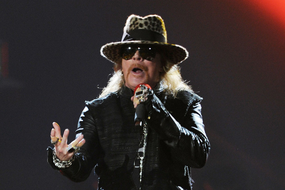 Axl Rose is ending his 30-year stage tradition of throwing his microphone to fans at the end of gigs