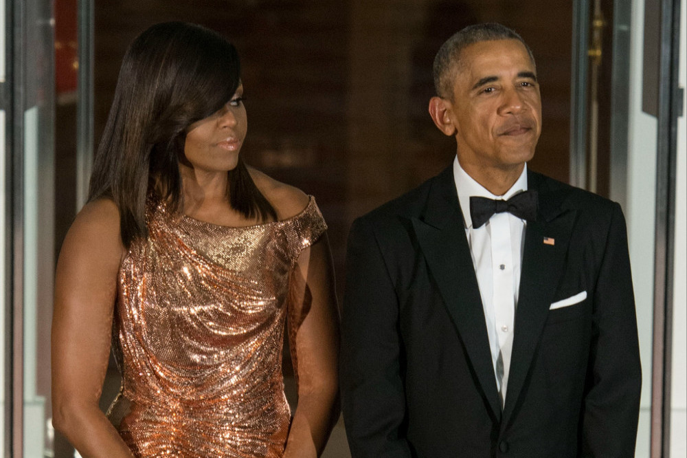 Barack and Michelle Obama have paid tribute to their chef