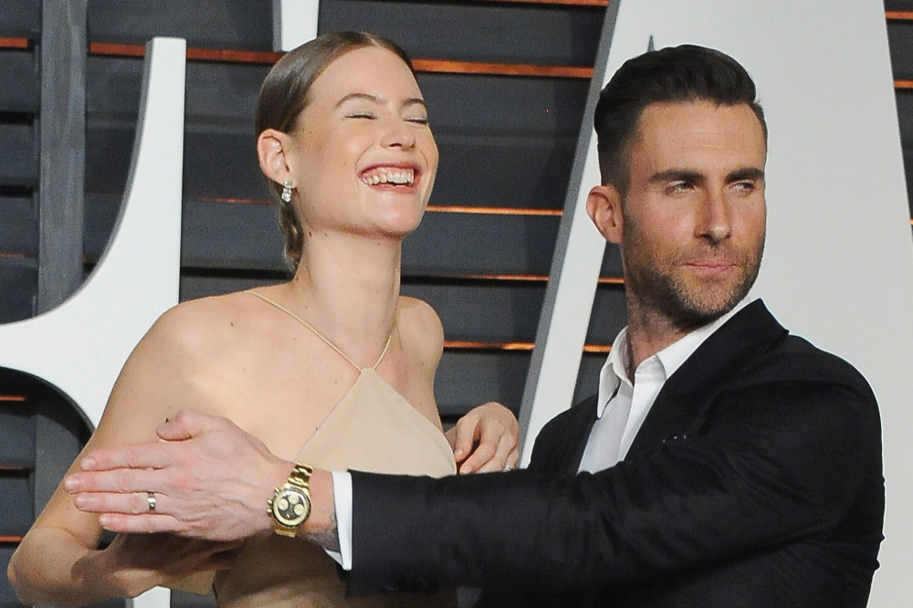 Behati Prinsloo believes Adam Levine when he says he did not have an affair