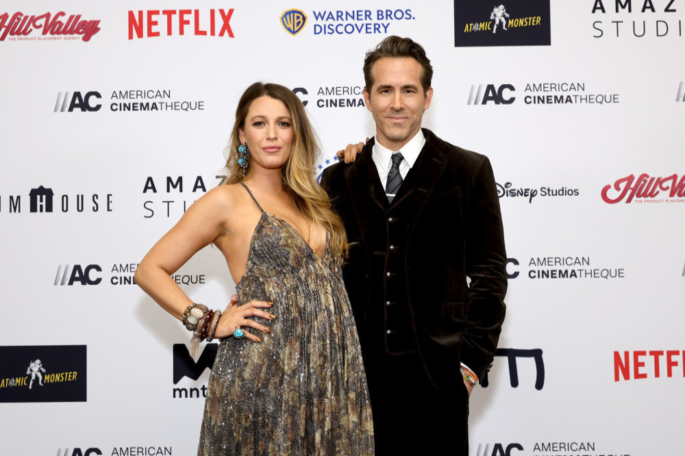 Ryan Reynolds has cheekily joked his wife keeps him active when he gets home