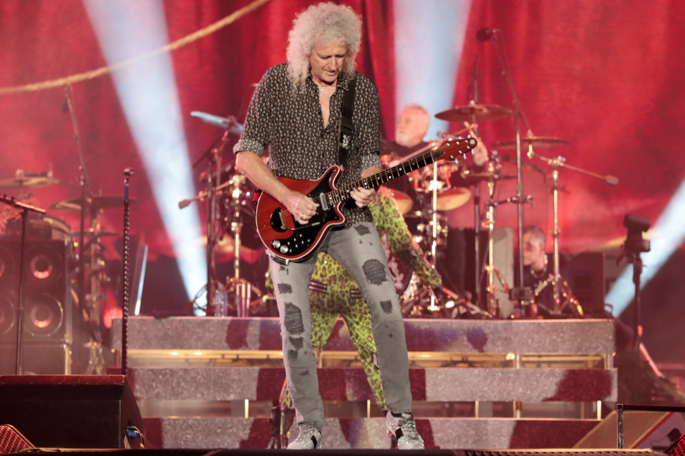 Queen's Brian May has opened up about losing Freddie Mercury and how the surviving members coped with the loss