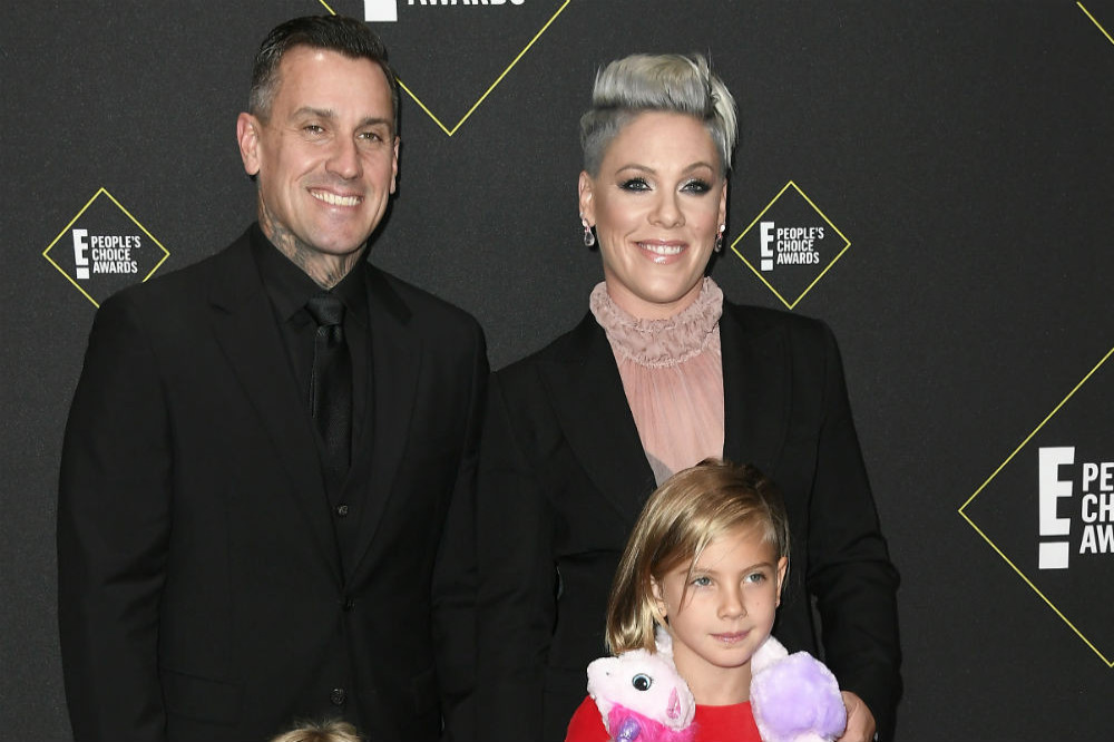 Carey Hart with his wife Pink and their kids