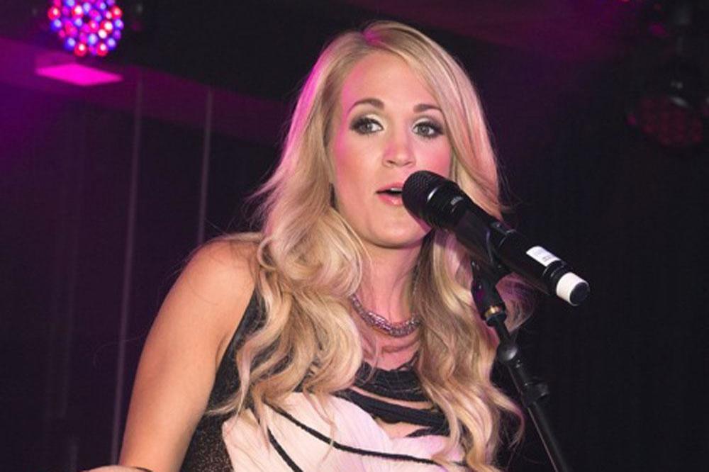 Carrie Underwood performing at The Edition Hotel 