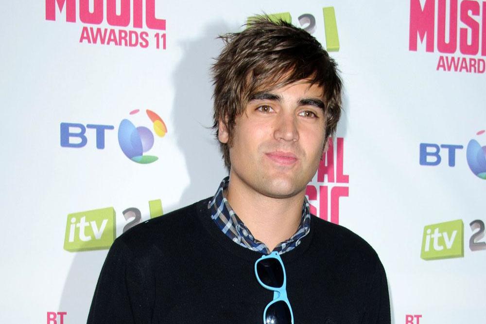 Charlie Simpson back in Busted