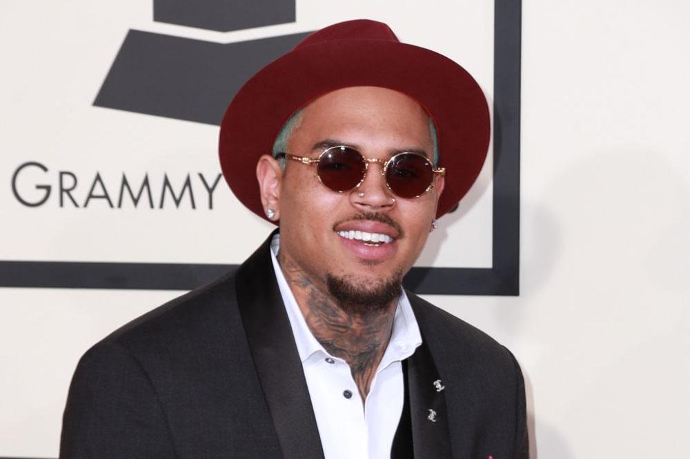 Chris Brown has secretly fathered a baby girl with a former model named Nia, it has been claimed.