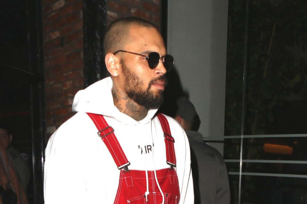 Chris Brown appears to send his well wishes to Rihanna