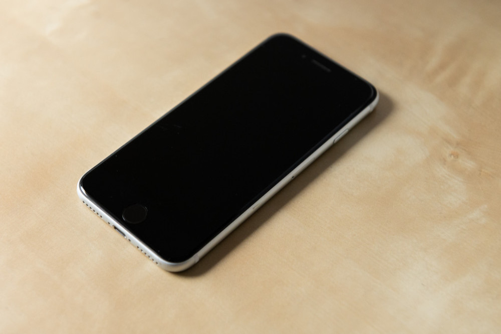A man has been reunited with an iPhone he lost in a river last year