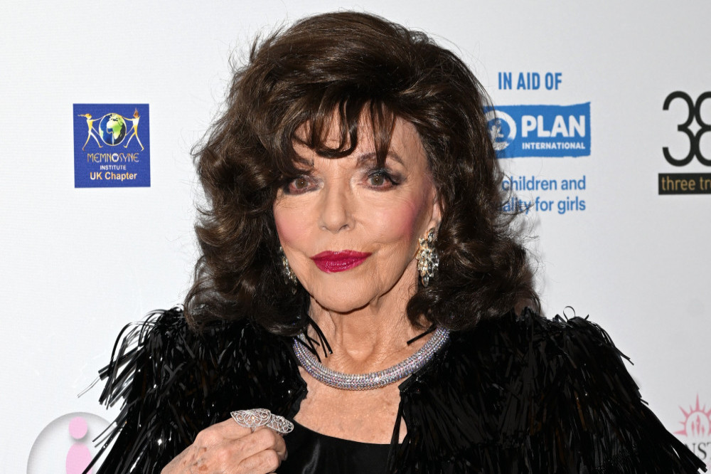 Dame Joan Collins refuses to talk about the Duke and Duchess of Sussex