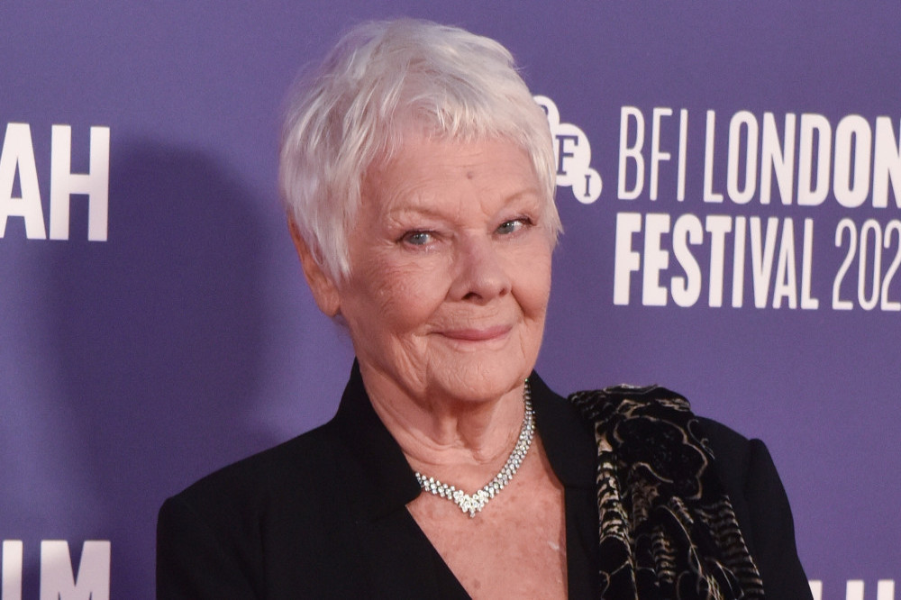 Dame Judi Dench has opened up about her love of trees - revealing she plants them in her garden to remember friends who have passed away