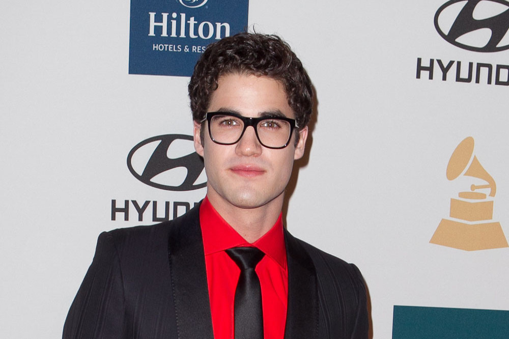 Darren Criss is griefstricken by the loss of his brother to suicide