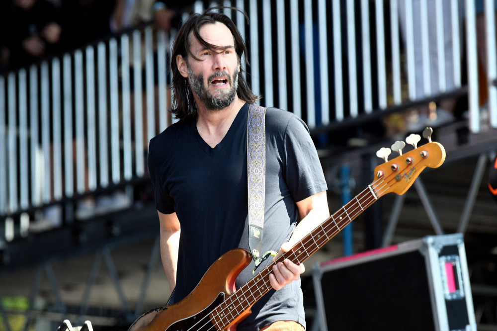 Keanu Reeves received bass guitar lessons from Flea