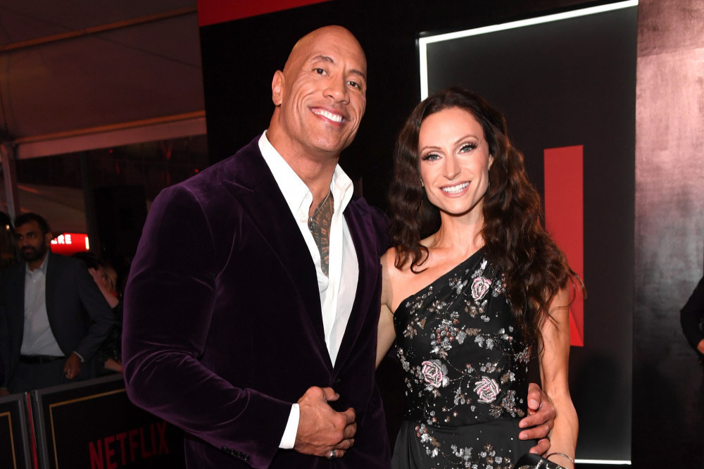 Dwayne Johnson with wife Lauren Hashian at the premiere of his new film Red Notice