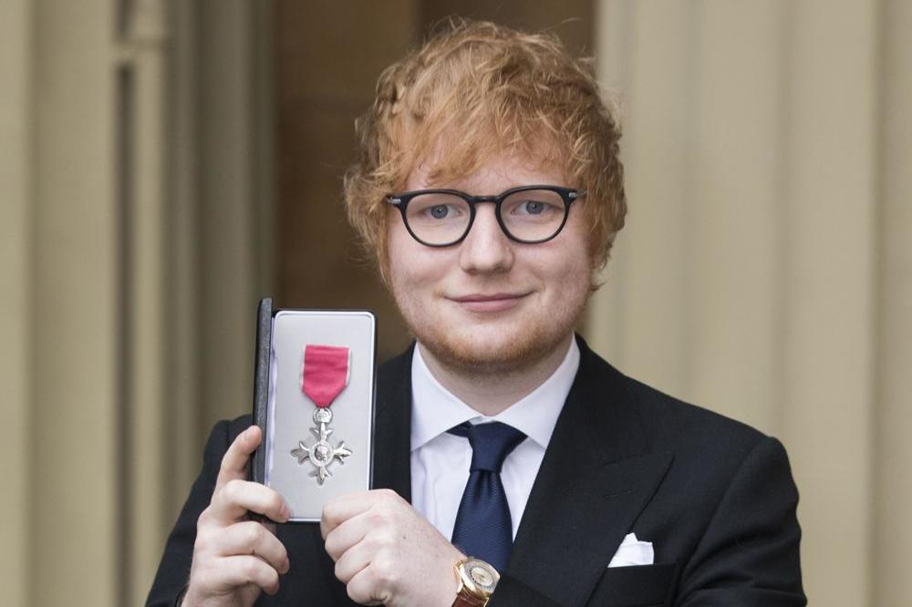 Ed Sheeran collects his MBE at Buckingham Palace 