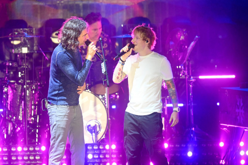 Ed Sheeran joined Snow Patrol on stage in a surprise appearance (c) Dave J. Hogan/Getty Images