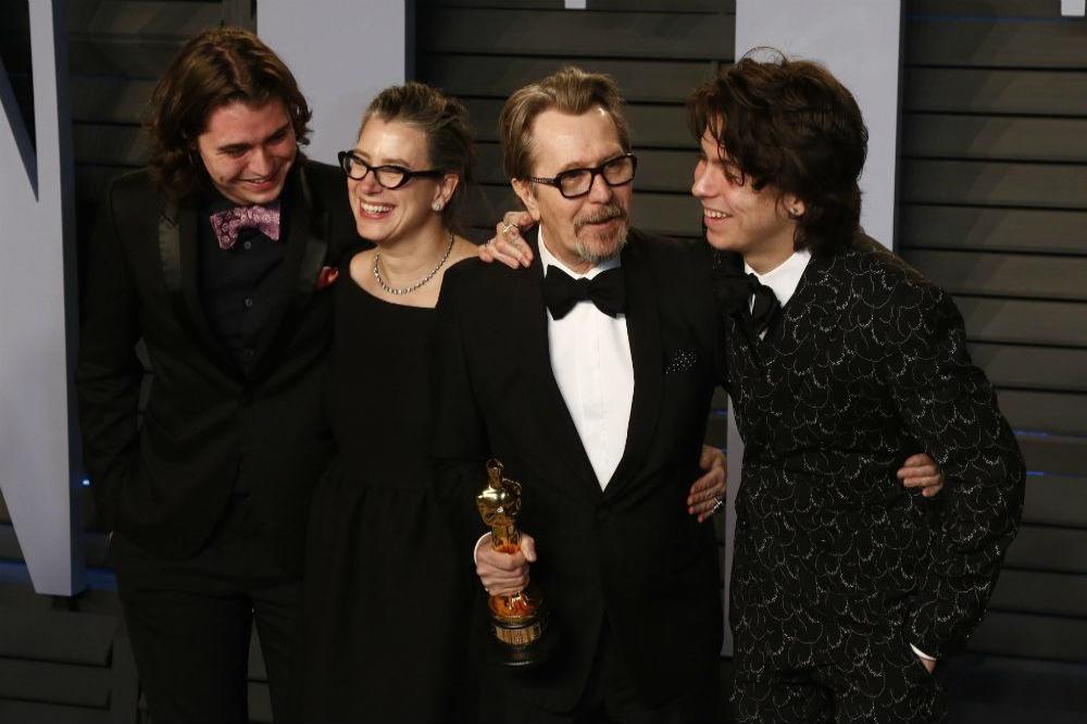 Gary Oldman with his sons and wife Gisele