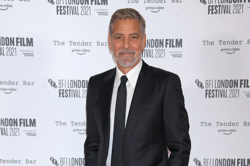 George Clooney calls up Santa Claus to discipline his children