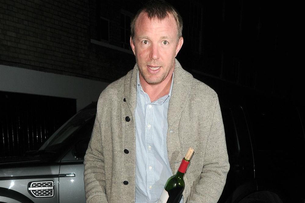 Guy Ritchie visits Madonna's London home