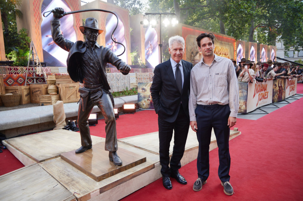 Harrison Ford beamed as he attended the unveiling of an Indiana Jones statue to mark the release of the fifth film featuring his iconic explorer character