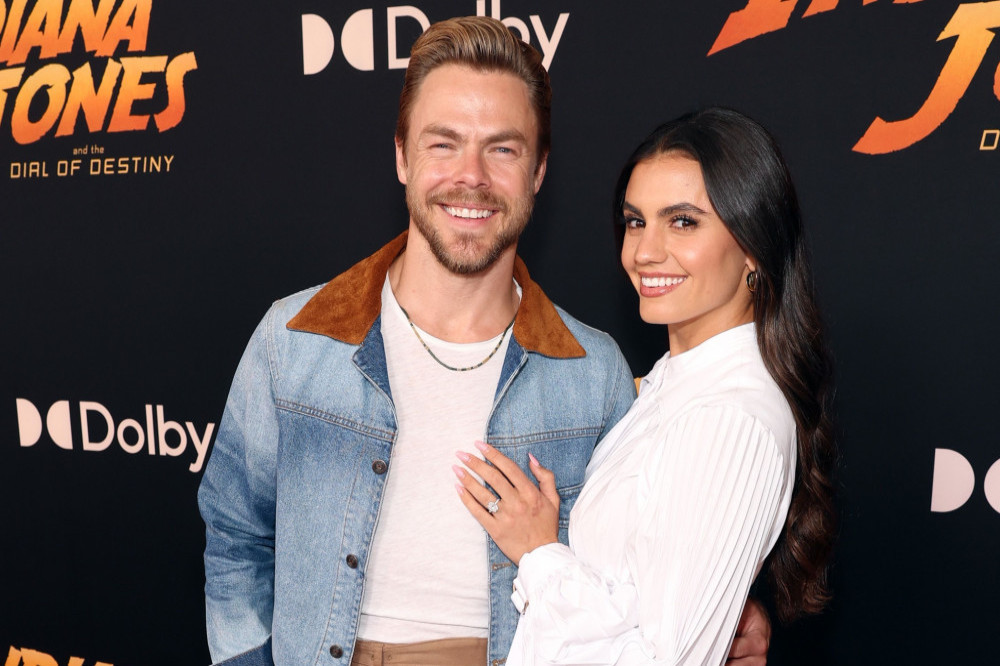 Derek Hough  has hailed his wife as incredible following her skull surgery