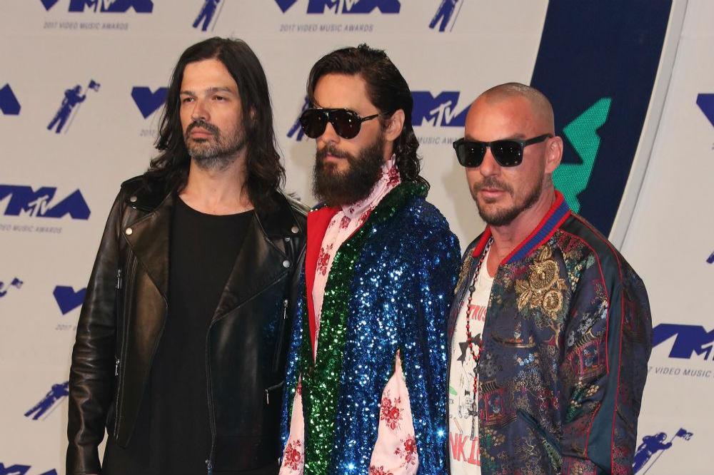 Jared Leto with his 30 Seconds To Mars bandmates