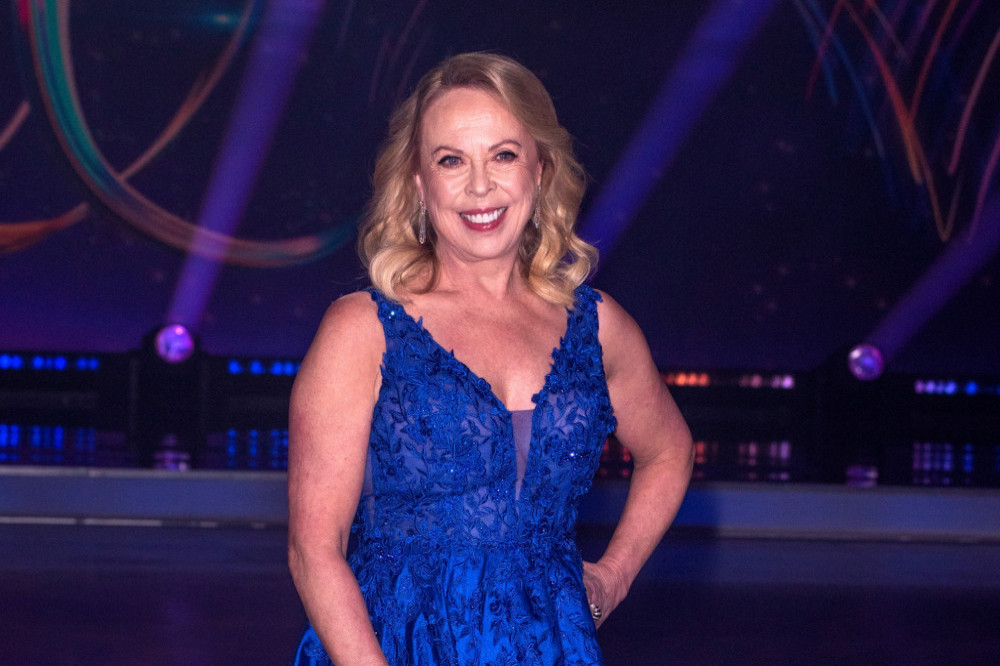 Jayne Torvill needs to have surgery after injuring her arm