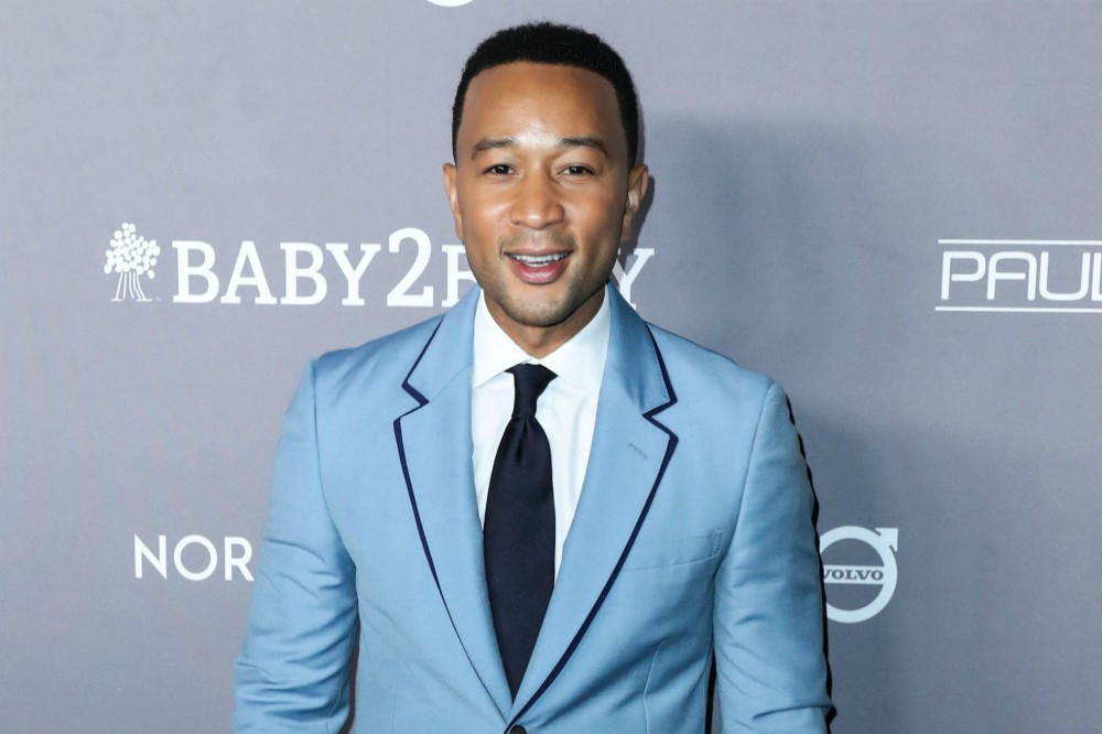 John Legend has a vast collection robes just like his wife ...