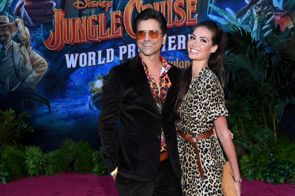 John Stamos and Caitlin McHugh Stamos