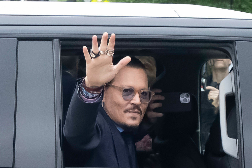 Johnny Depp warns fans about bogus accounts pretending to be him
