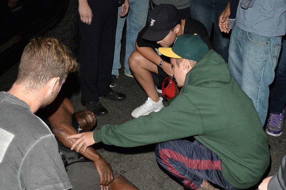 Justin Bieber and injured paparazzo