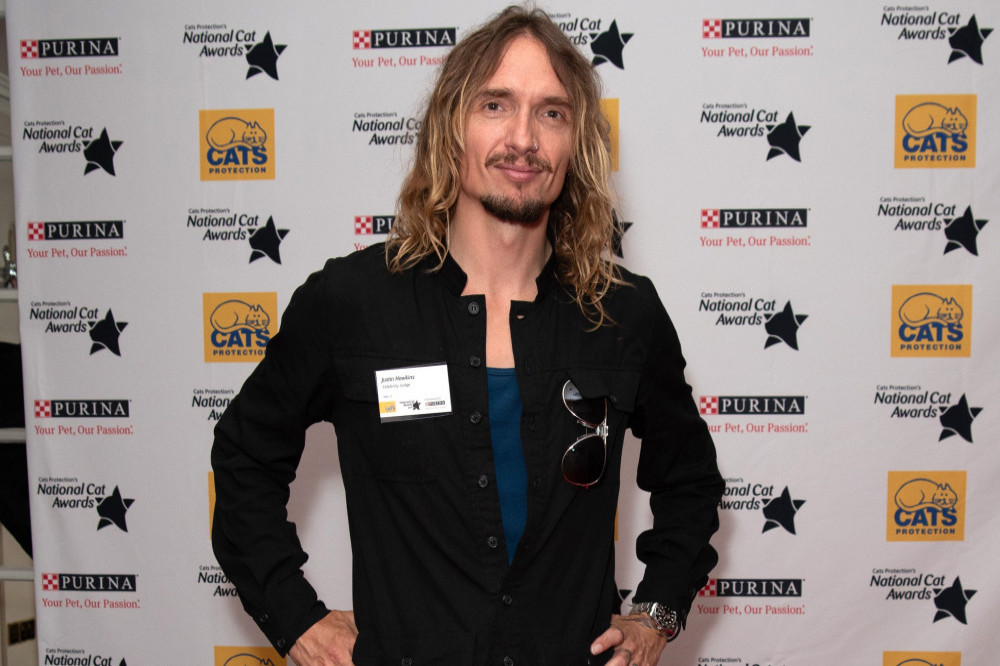 The Darkness star Justin Hawkins thought he was too old to be a rock singer at the age of 18