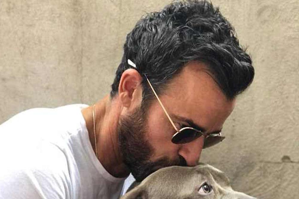 Justin Theroux and his dog (c) Instagram