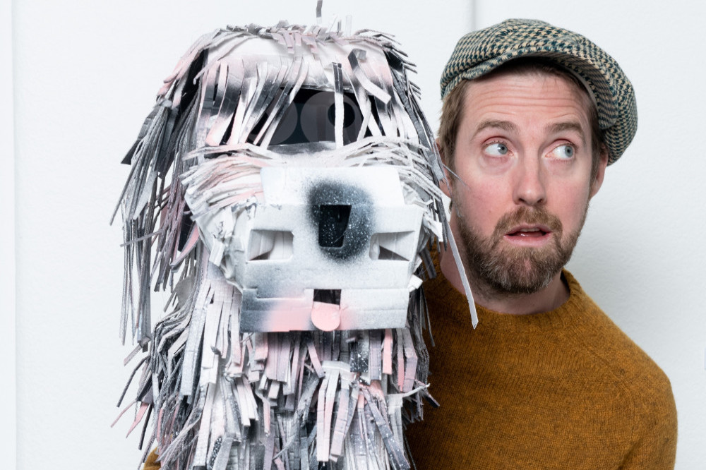 Kaiser Chiefs' frontman Ricky Wilson and his dog sculpture