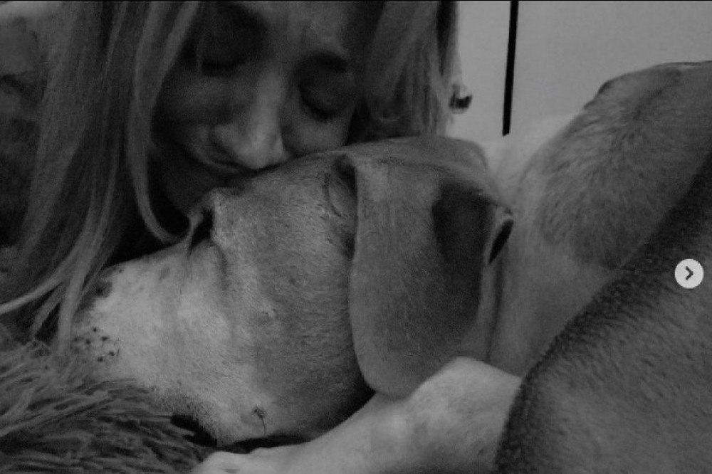 Kaley Cuoco and dog Norman (c) Instagram