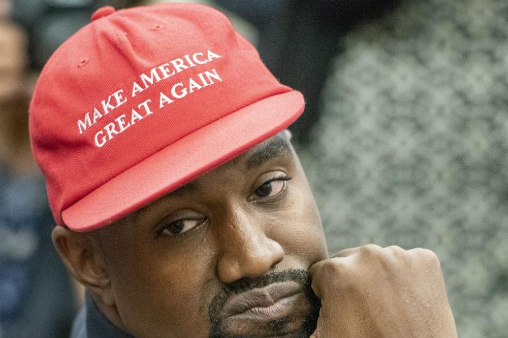 Kanye West pledges to perform in his Make America Great Again cap