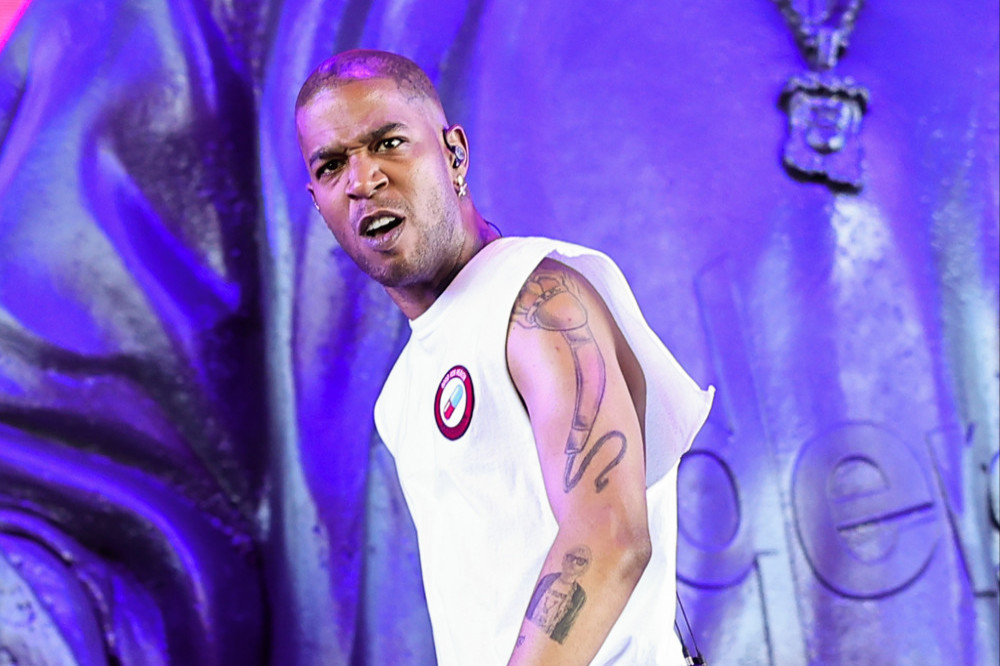 Kid Cudi was rocking Coachella until he seemingly twisted his ankle in stage fall